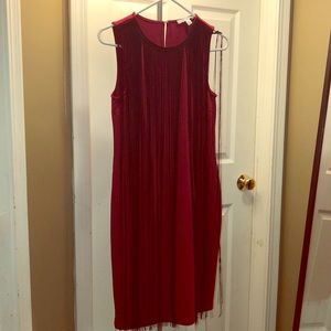Red bodycon dress with black tassels